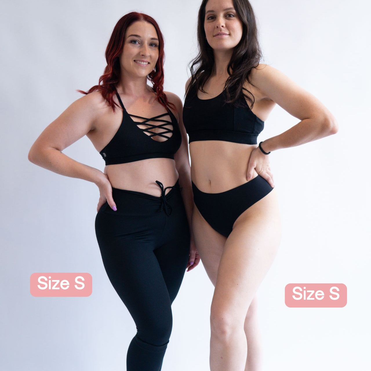 Two models wearing black Fredgies