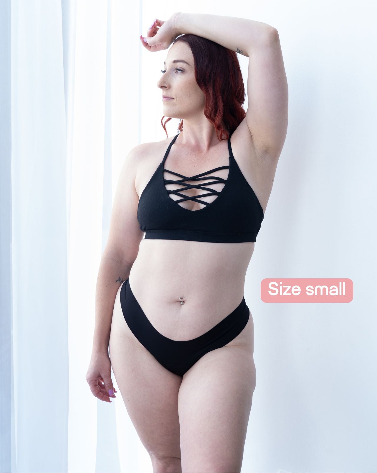 Model wearing black seamless Fredgies thong