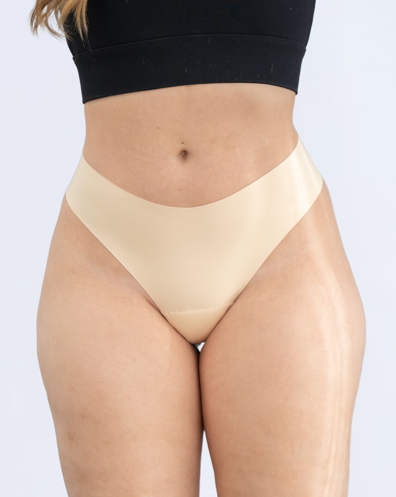 Close up of woman wearing Fredgies camel toe proof undies