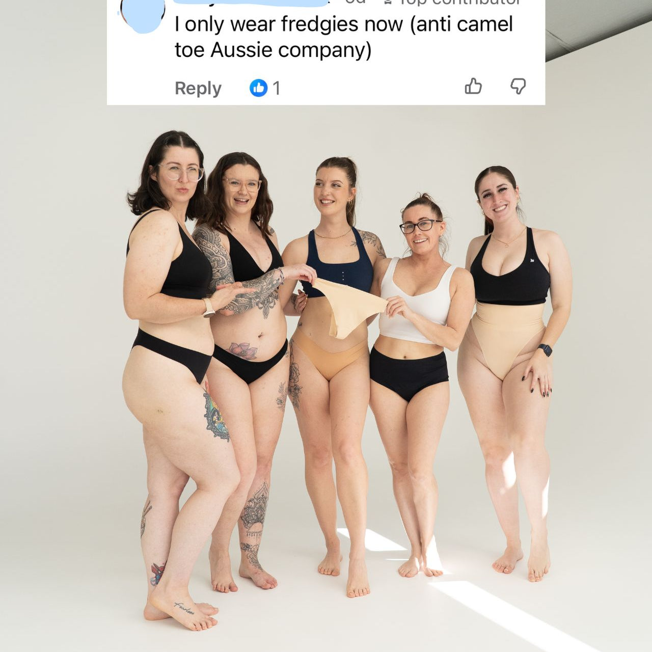 Five women standing in a studio wearing various shades of nude and blackunderwear, with a screenshot of a comment above them.