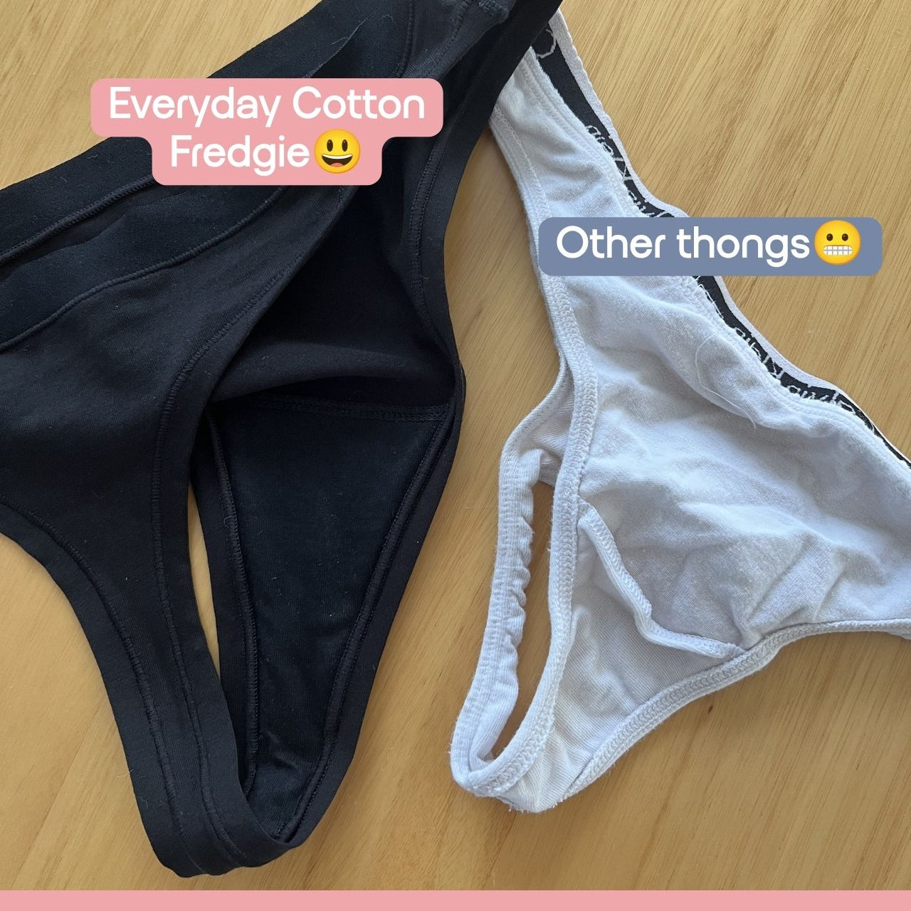 Two pairs of underwear laid flat on a light wood surface: a black pair labeled 'Everyday Cotton Fredgie' and a white pair labeled 'Other thongs'. A pink banner at the bottom reads 'Making gussets actually comfortable'.