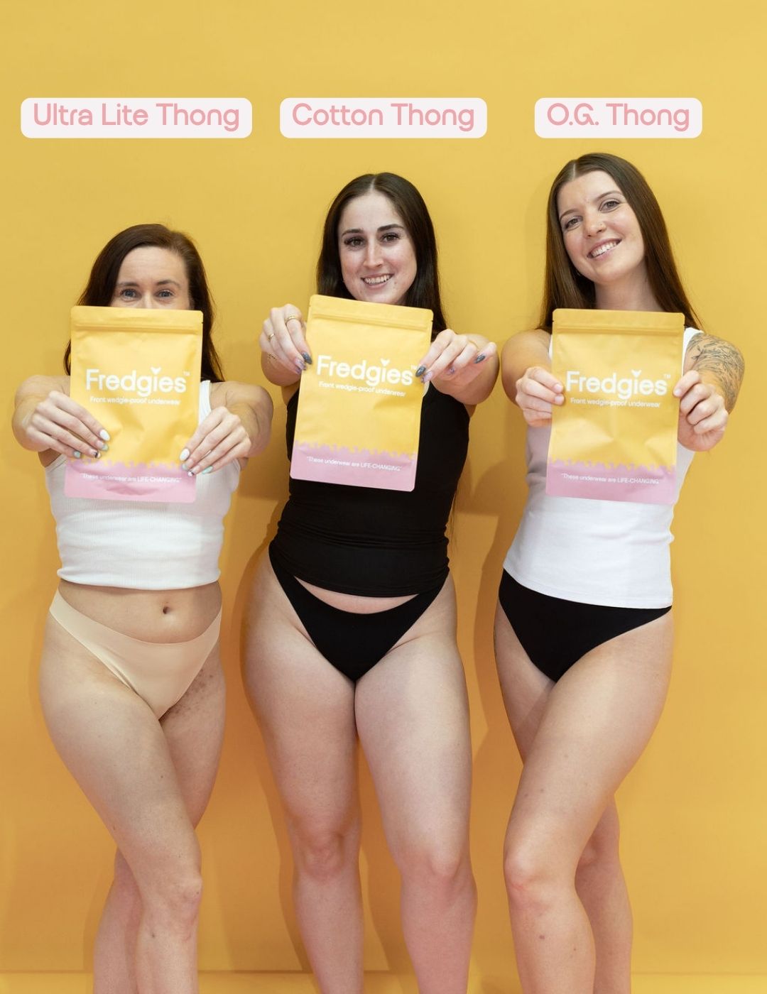 Three women holding yellow packages labeled 'Ultra Lite Thong', 'Cotton Thong', and 'O.G. Thong' against a yellow background.