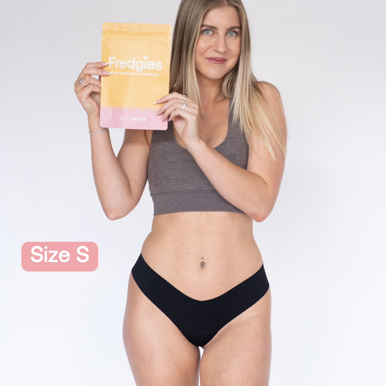 Model holding Fredgies packaging