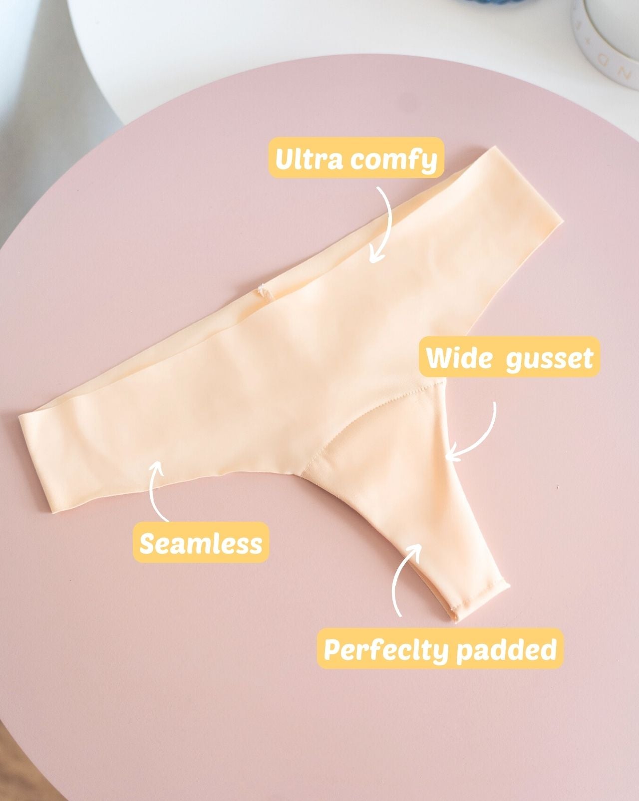 Beige Fredgies thong on a table