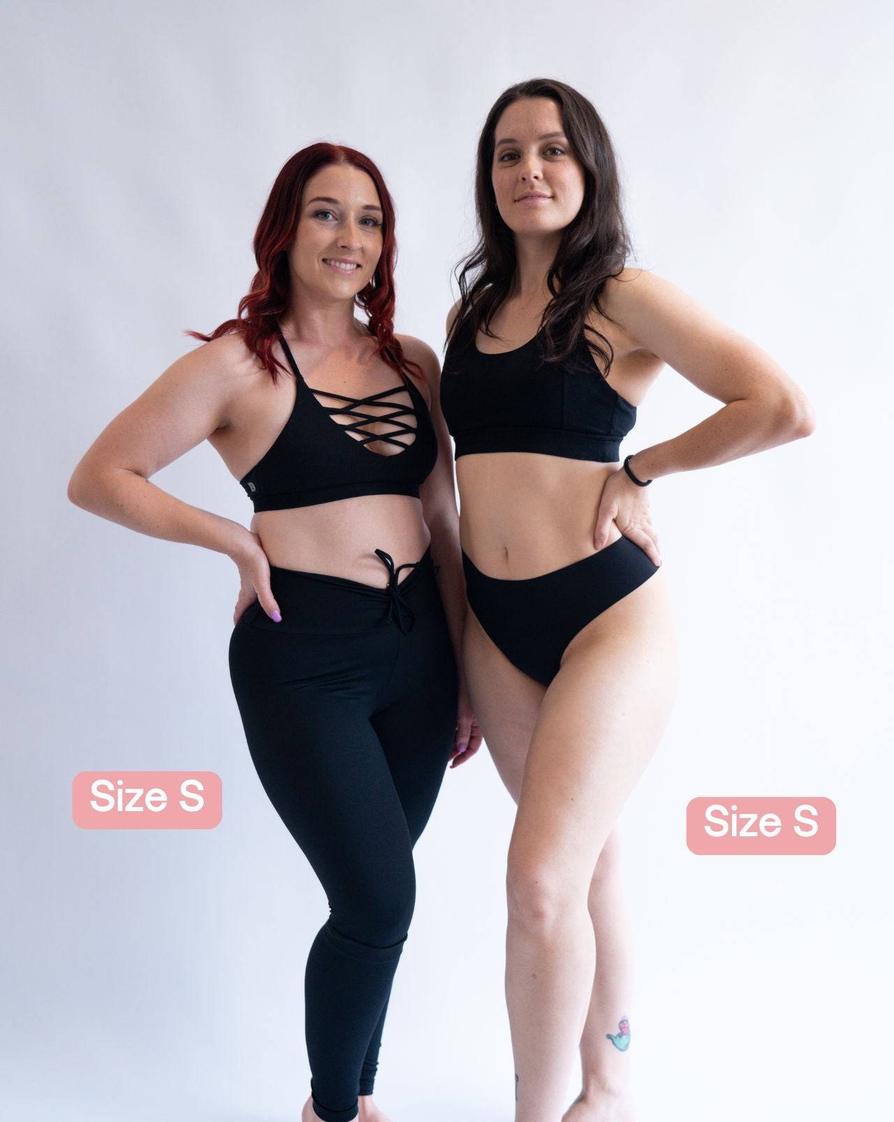 Two models wearing black Fredgies