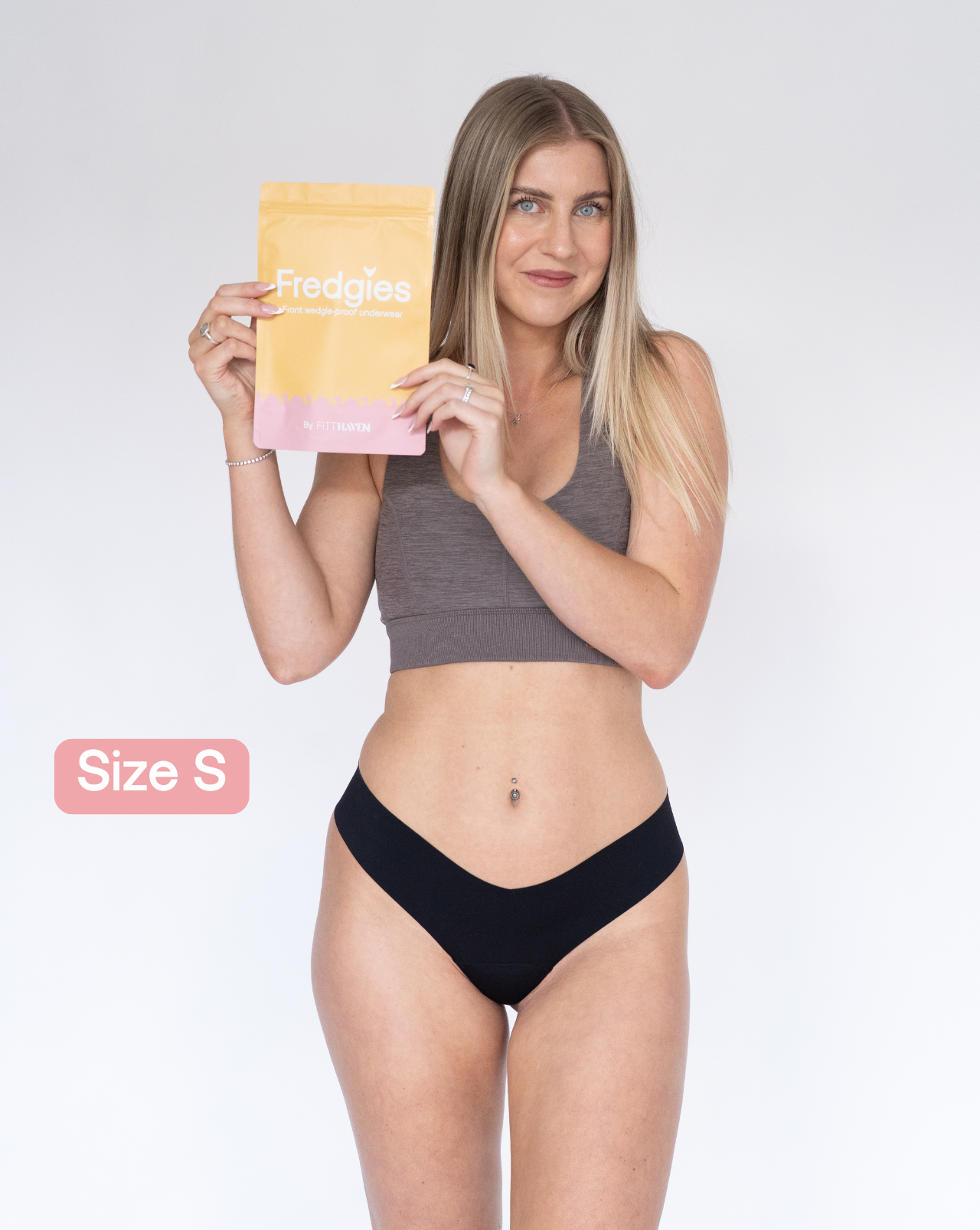 Model holding Fredgies packaging